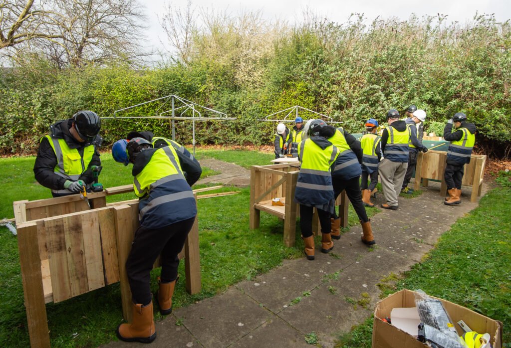 Local students building three planters for Thames View Lodge.